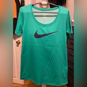 NWT, Women’s Size Small The Nike Tee Teal Short Sleeve Tee
